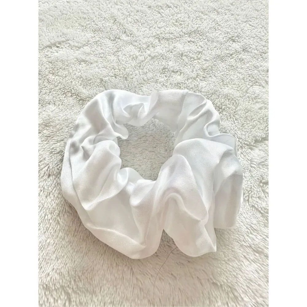 Bright white color satin hair scrunchie